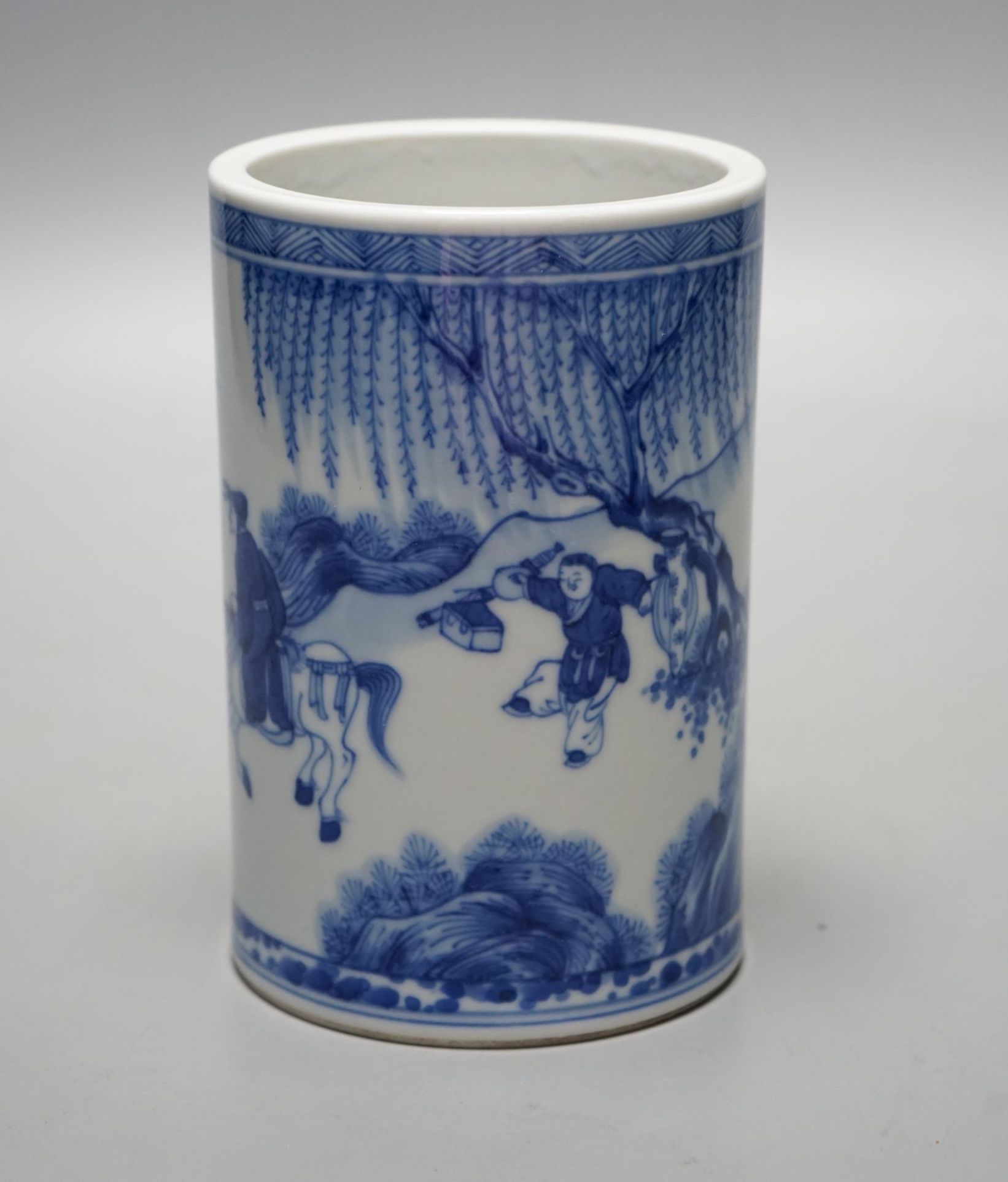 A Chinese blue and white brush pot, 14 cms high.